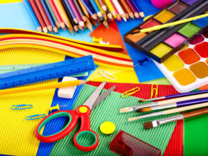 School and art supplies spread out on a table